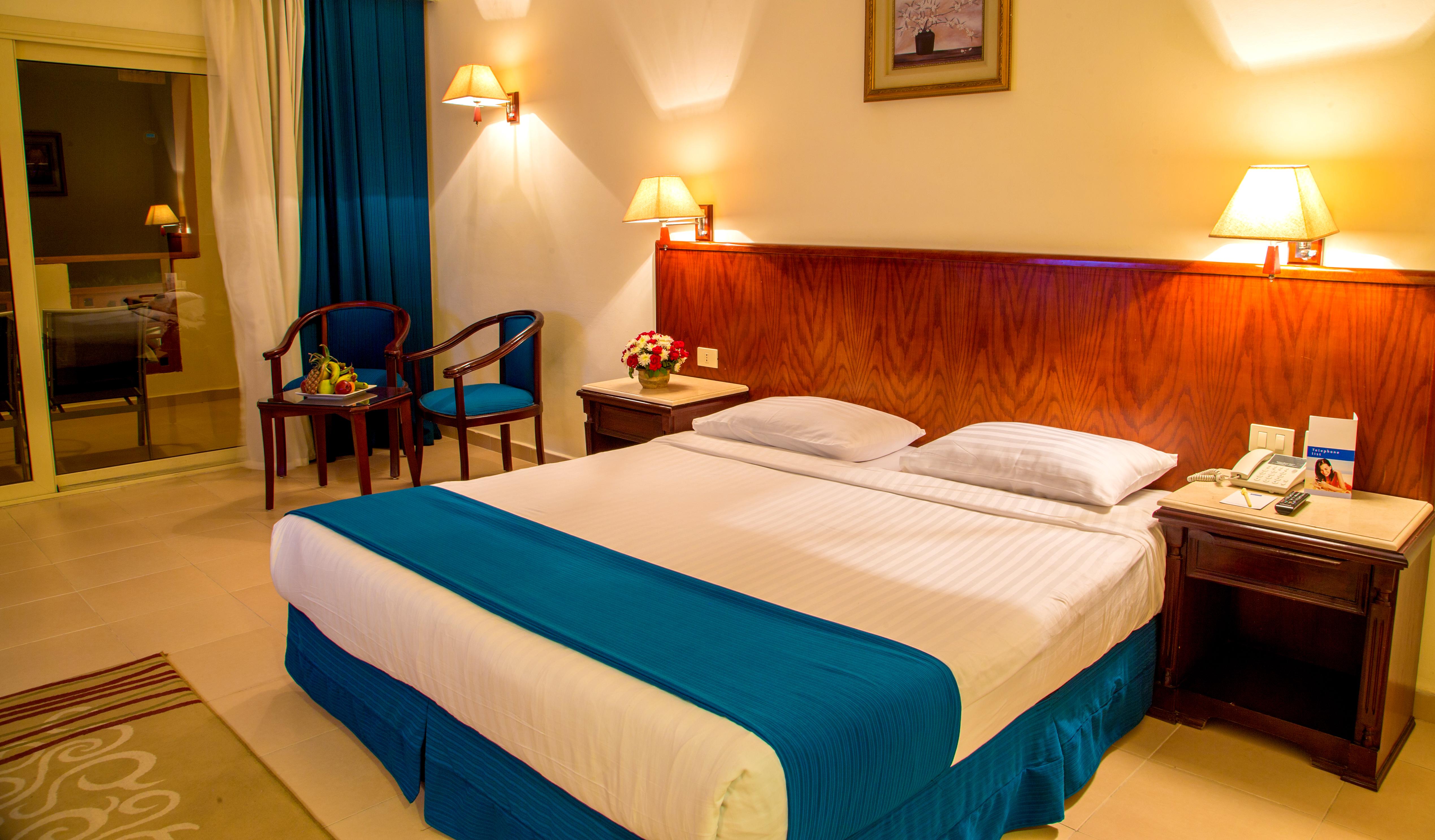 Serenity Alpha Beach - Ex Serenity Makadi Beach Exterior photo A bedroom in a hotel