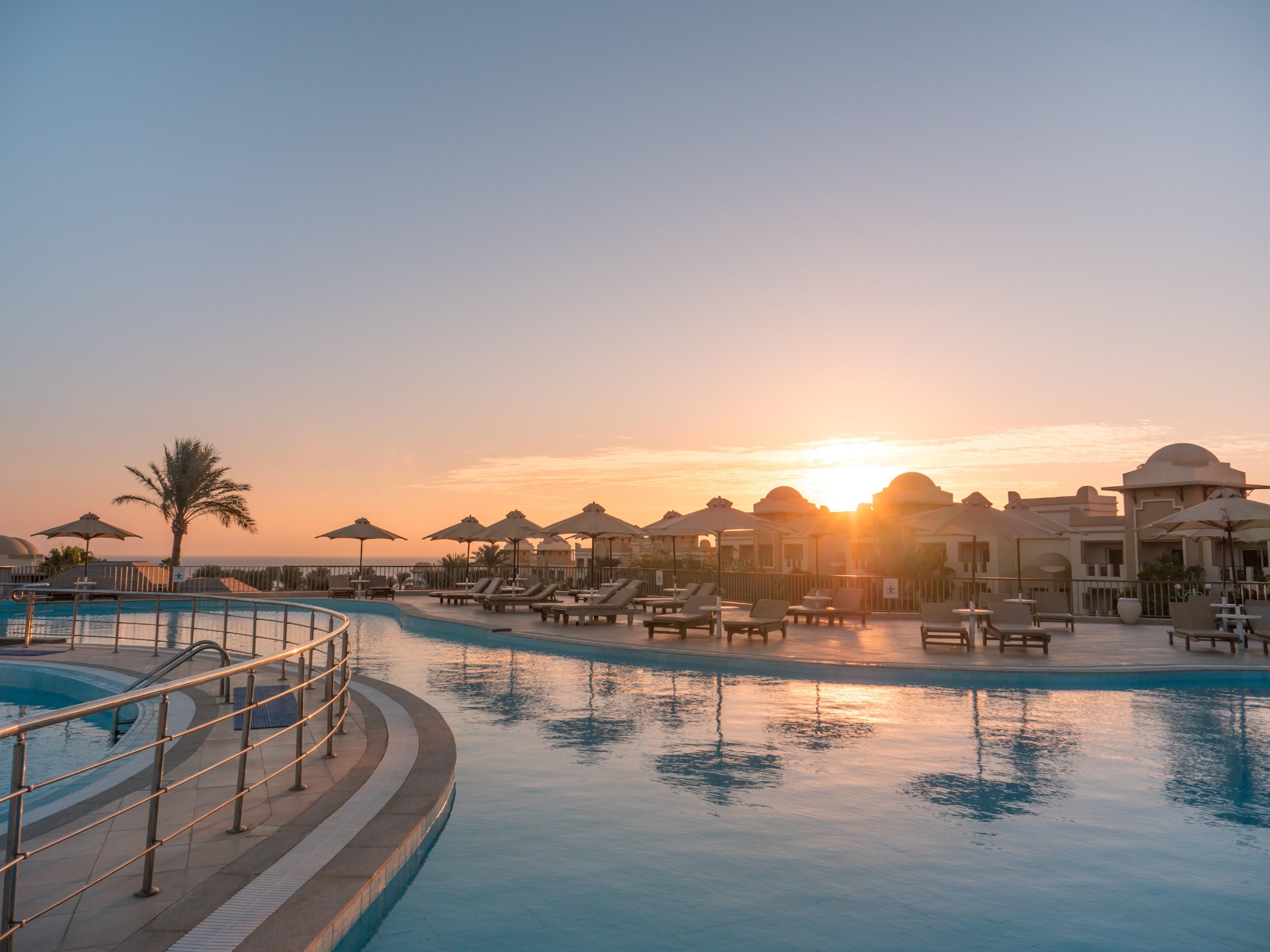 Serenity Alpha Beach - Ex Serenity Makadi Beach Exterior photo Sunset at the pool