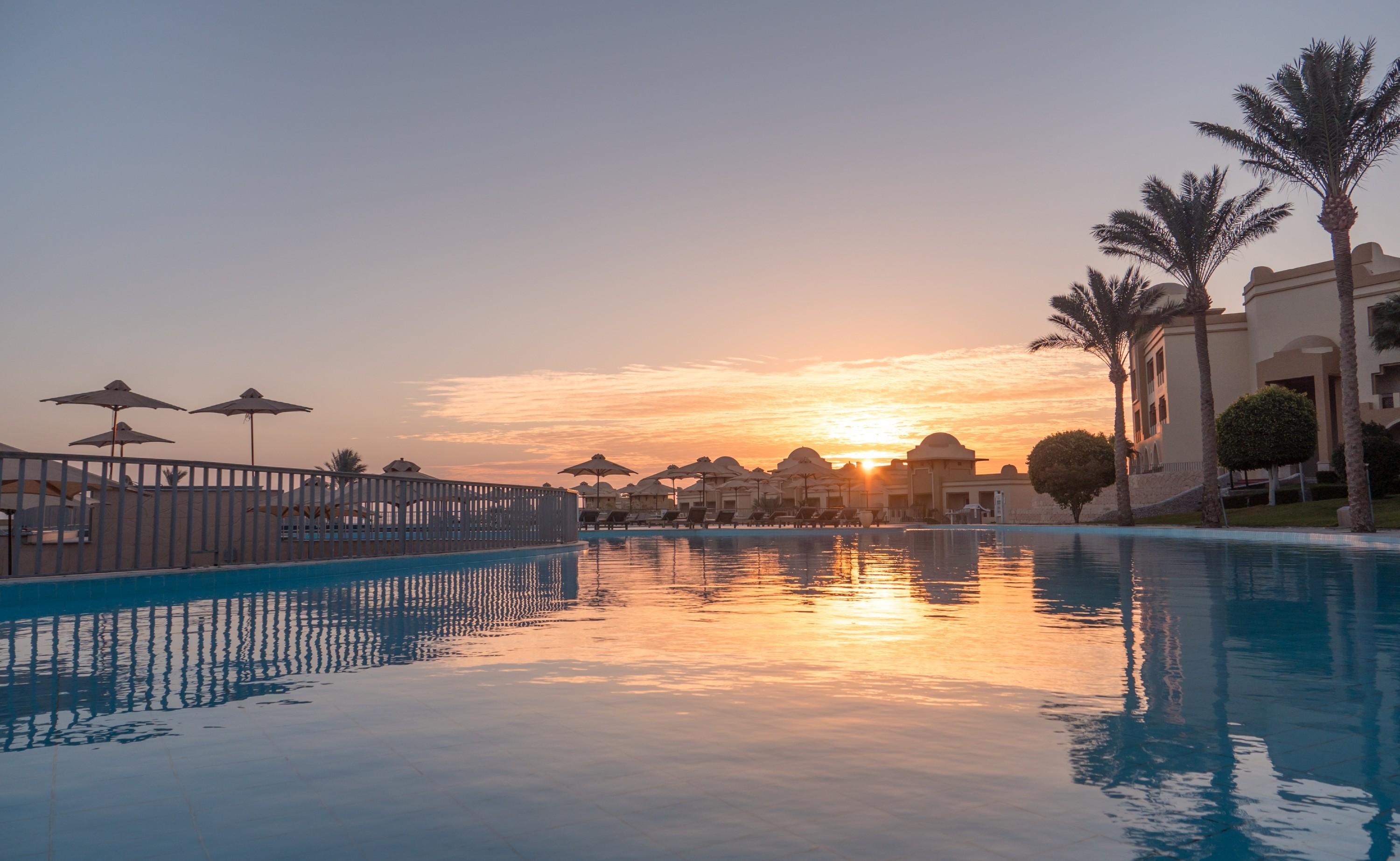 Serenity Alpha Beach - Ex Serenity Makadi Beach Exterior photo Sunset at the pool
